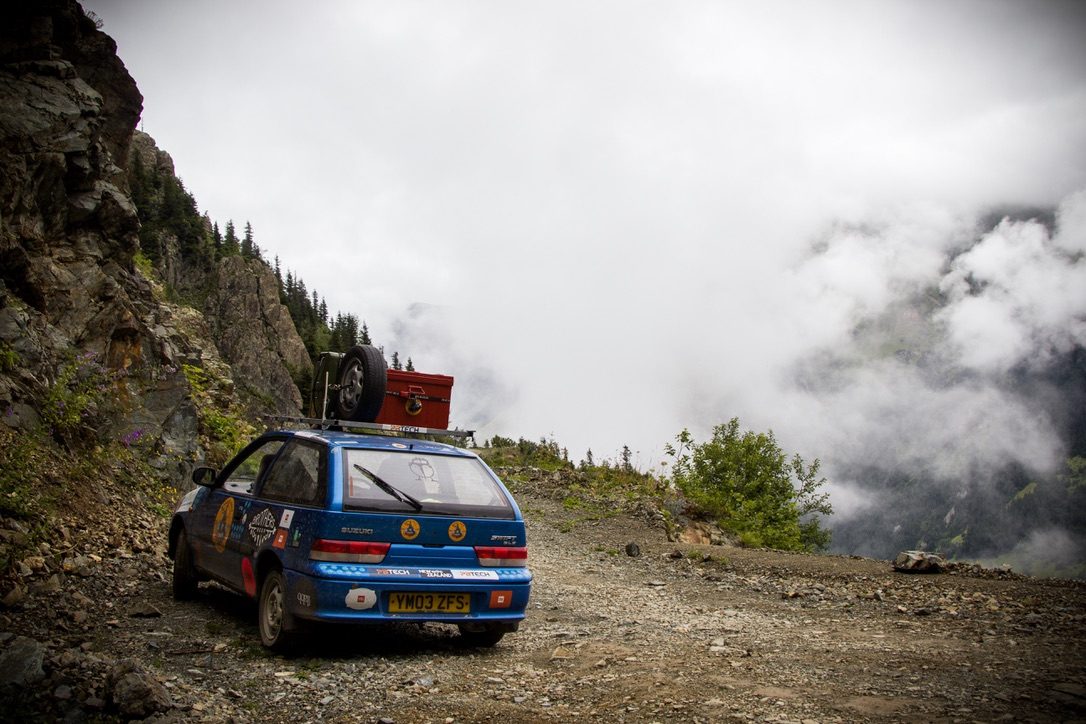 Mongol Rally, cloud-wrapped switchback